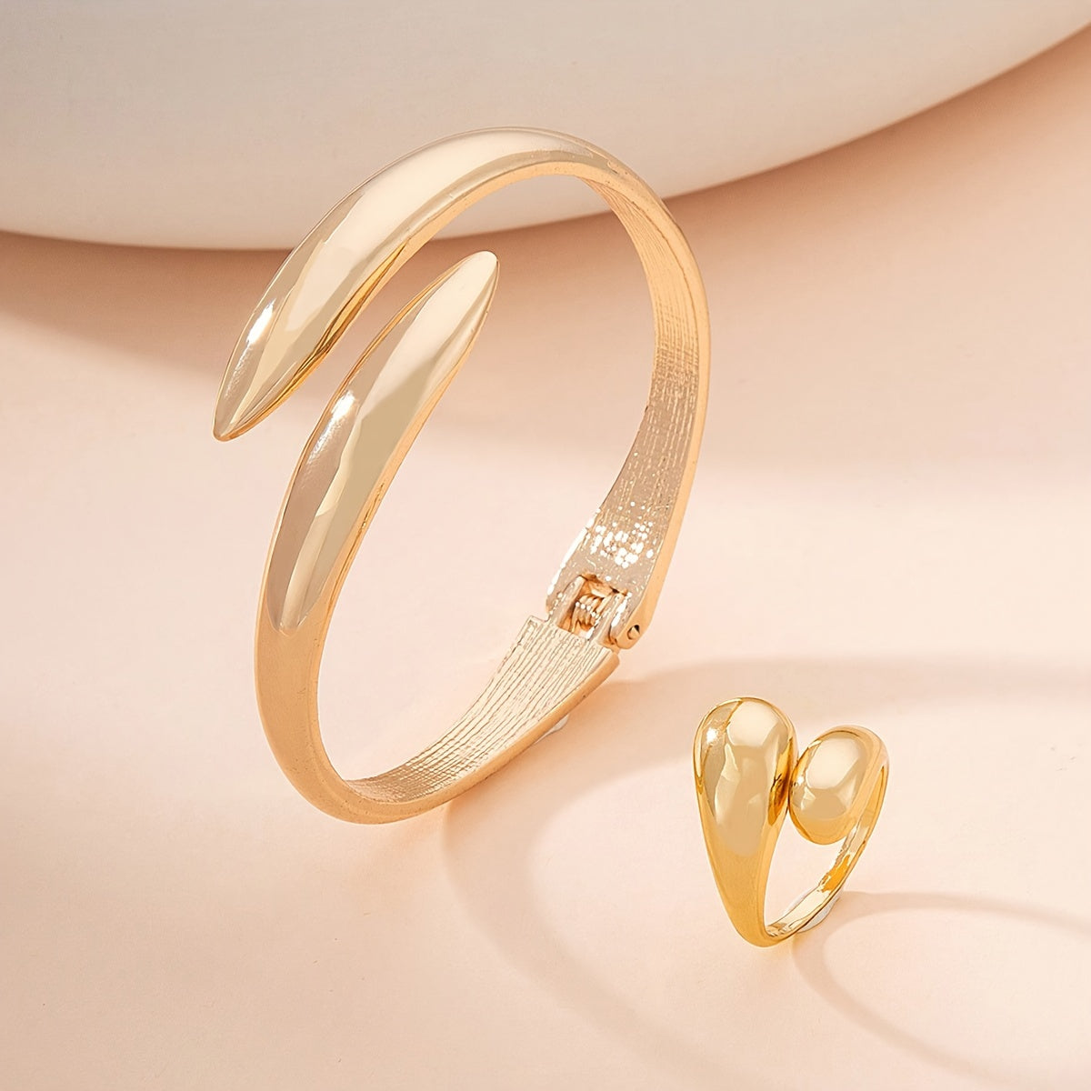 A Set Of Golden Bracelet And Ring